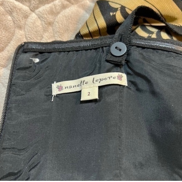 Nanette Lepore size 2. Gorgeous Black and gold Cocktail dress . Beaded waist . - Picture 5 of 6